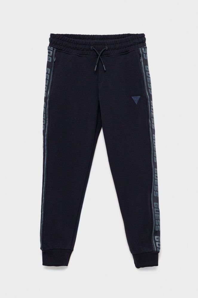 Дитячі спортивні штани Guess колір синій з аплікацією (2420926)