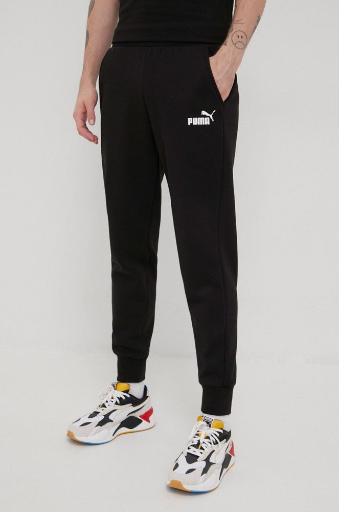 Штани Puma 586714 чоловічі колір чорний з принтом
