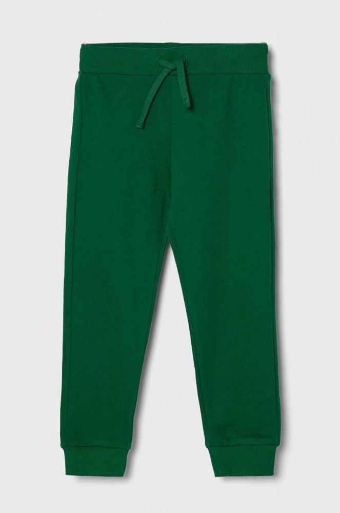 Дитячі бавовняні штани United Colors of Benetton колір зелений однотонні (3387887)